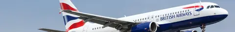 British Airways Club World business class cabin on a long-haul flight from the UK