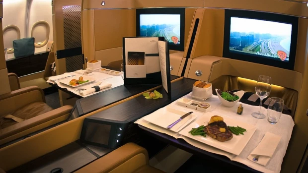 First class private suite with a closing door on a long-haul aircraft