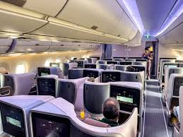 Singapore Airlines business class seat with dining setup
