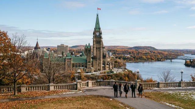 Parliament Hill and the Peace Tower above the Ottawa River